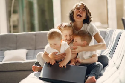 happy laughing mother with children
